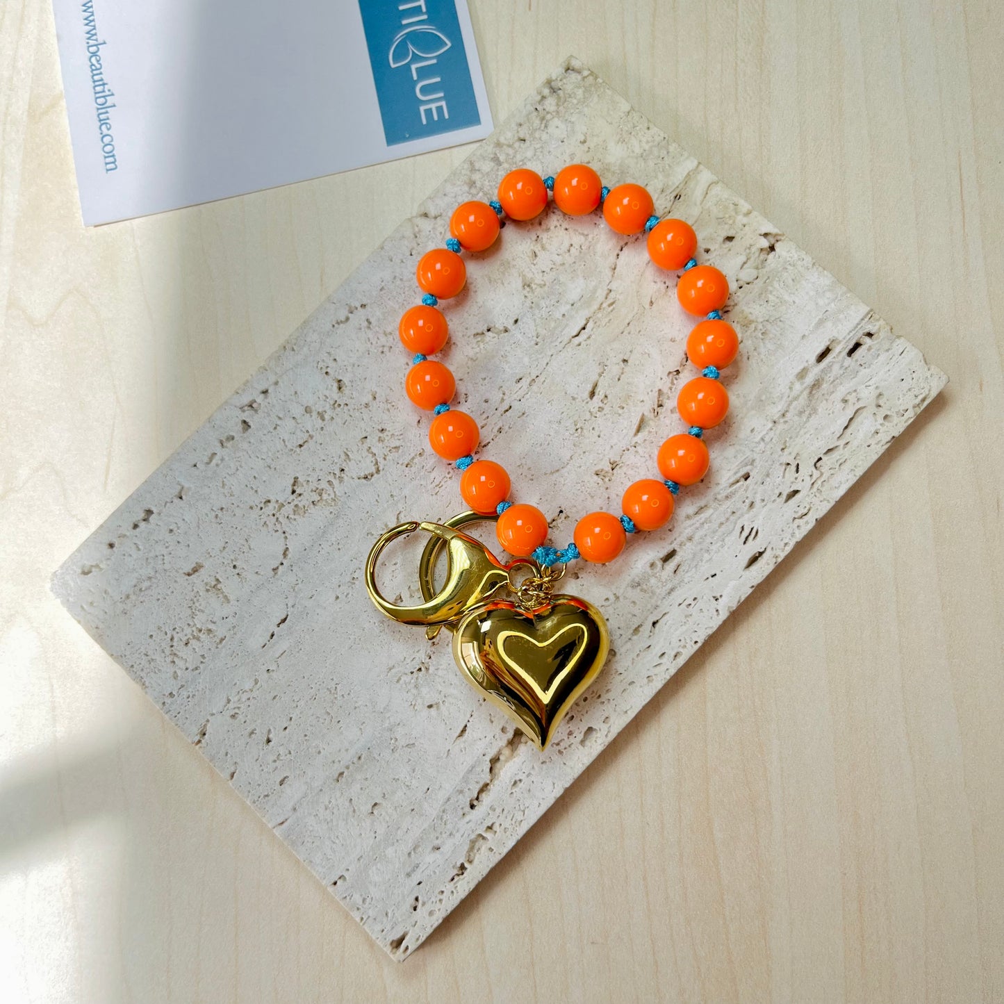 ORANGE BEADS KEYCHAIN