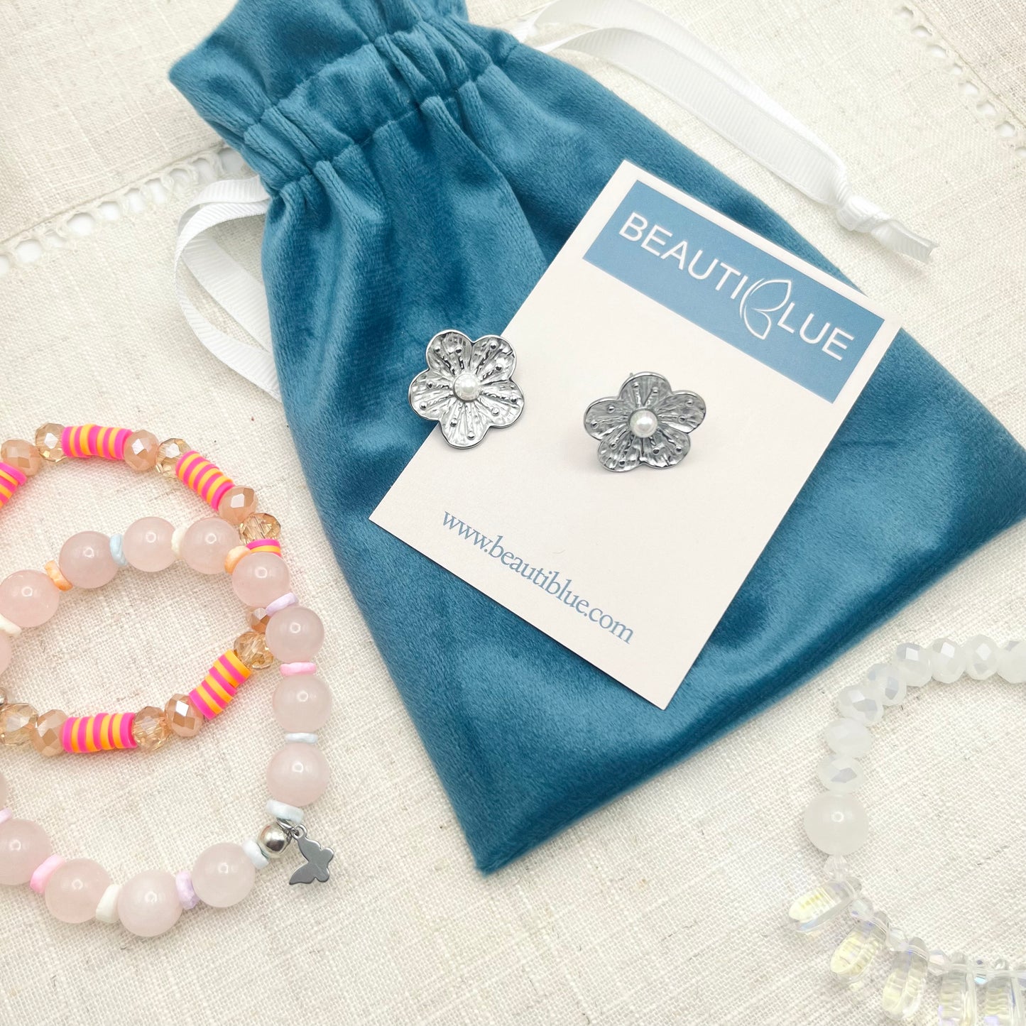 PENDIENTES DE FLORES