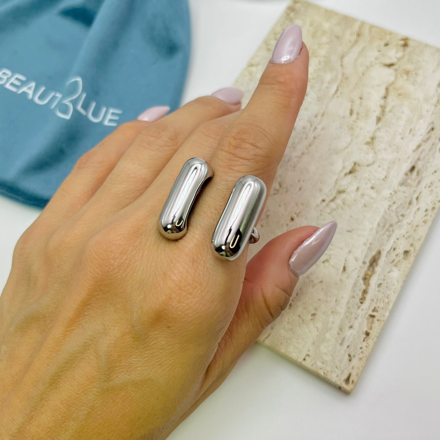 SILVER CAPSULE OPENING RING