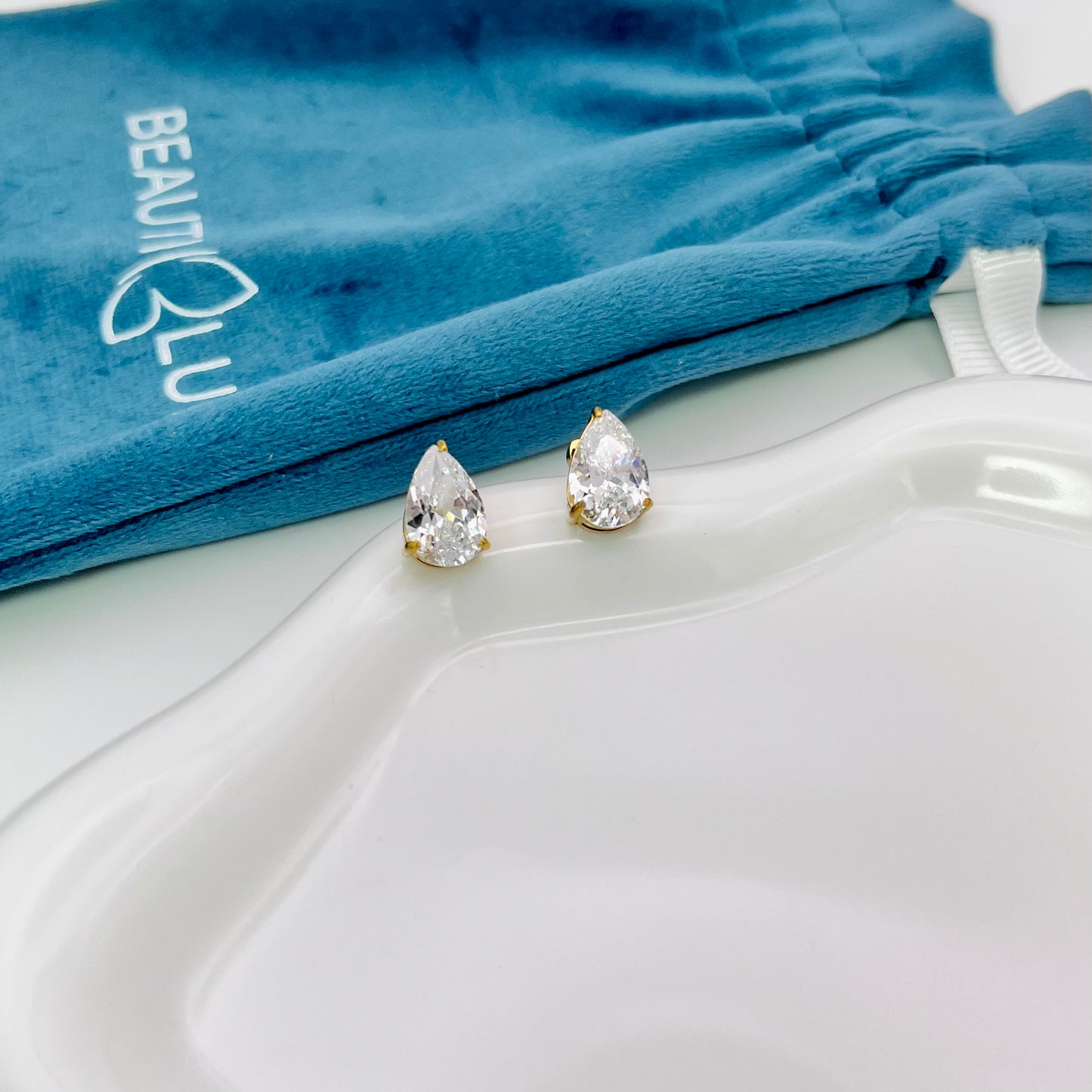 PEAR SHAPED STUD EARRINGS