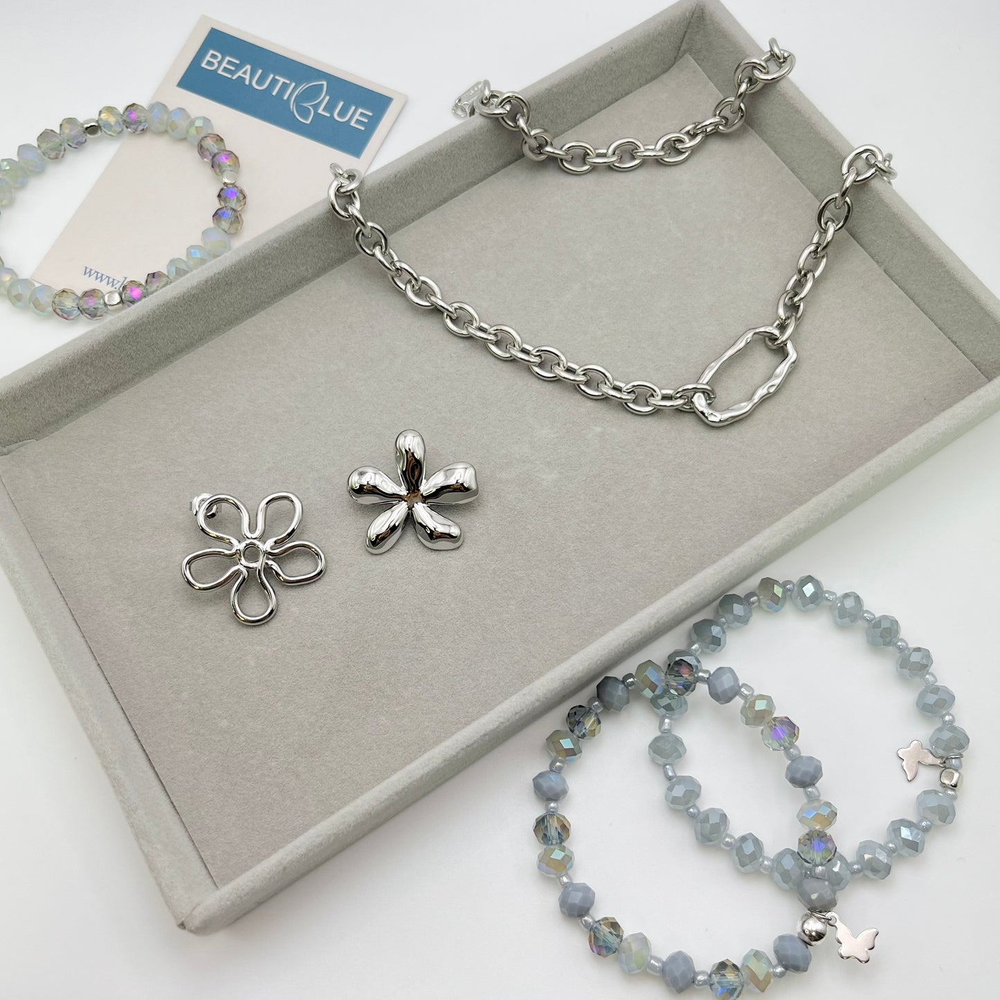 MISMATCHED FLOWER EARRINGS
